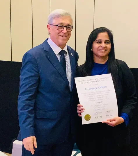 Dr. Kollipara receiving certification