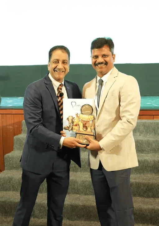Dr. Chandra Sekhar Receiving Award